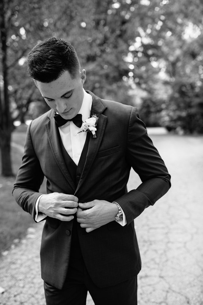 grooms attire, grooms suit, boutonniere, bow tie,