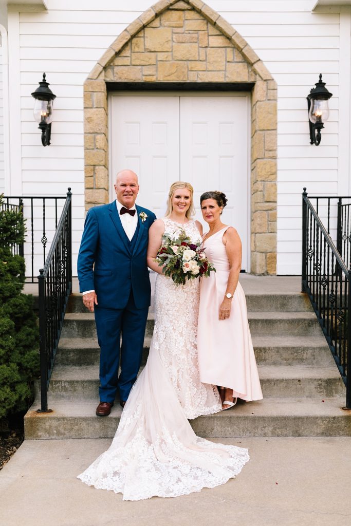 Summer wedding at the Hawthorne house, Kansas city wedding venue, Kansas city photographer, wedding inspo, wedding planning, wedding portraits, wedding pictures, sunset, golden hour, husband and wife, newlyweds, newly married, wedding ceremony, navy suit, lace wedding dress, maroon bow tie, family photos