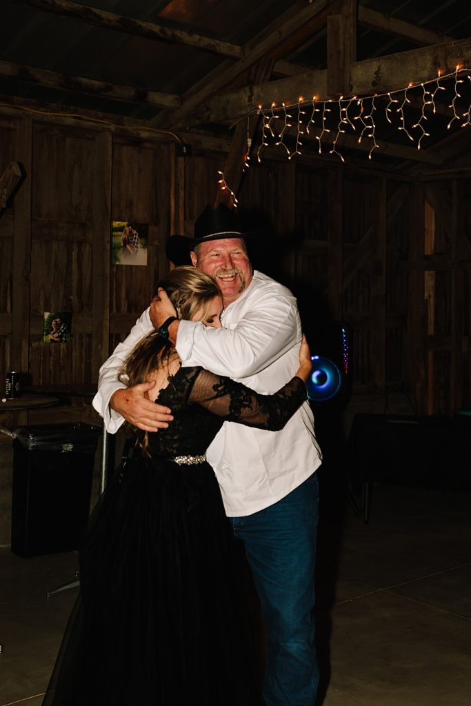 bride dancing with her step dad