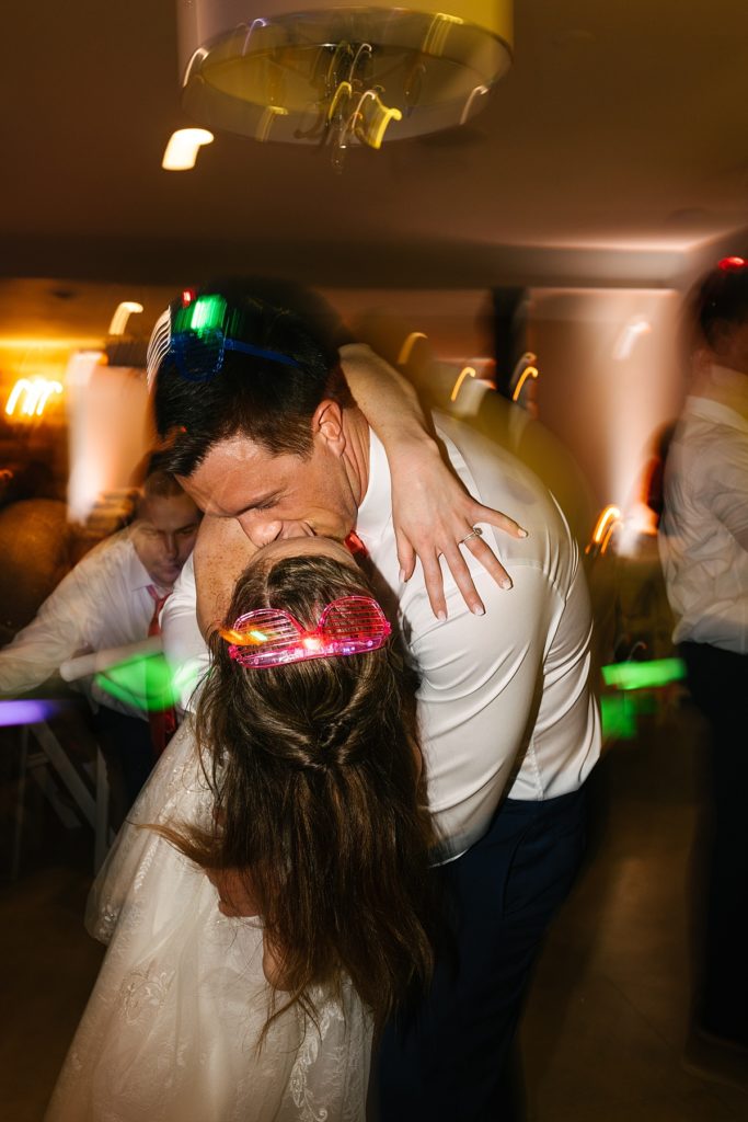 Bliss Plaza Event Venue, kansas city wedding venue, kansas city wedding photographer, wedding reception, wedding reception must haves, how to throw a great party, wedding reception inspiration, grand exit, amazon light up sticks, light up glasses