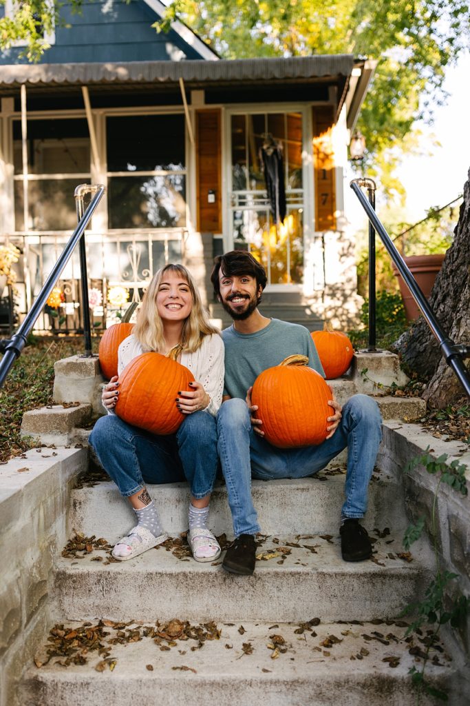 Five Tips For Your In-Home Photoshoot, Kansas City photographer, engagement session, engagement session locations, thrifted home decor, boho home, little blue house, fall engagement session, unique engagement session, intimate engagement session, true love, candid photos, looks like film, pumpkins, halloween decor, golden hour, front porch