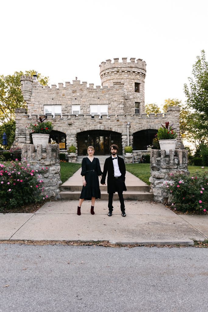Kansas city photographer, tiffany castle, halloween inspired engagement session, spooky engagement session, alternative engagement session, anti-bride, punk, real couple, castle engagement session, abandon building, abandon castle, october, fall photoshoot, black dress, girl with tattoos, looks like film, film engagement photos, the adams family