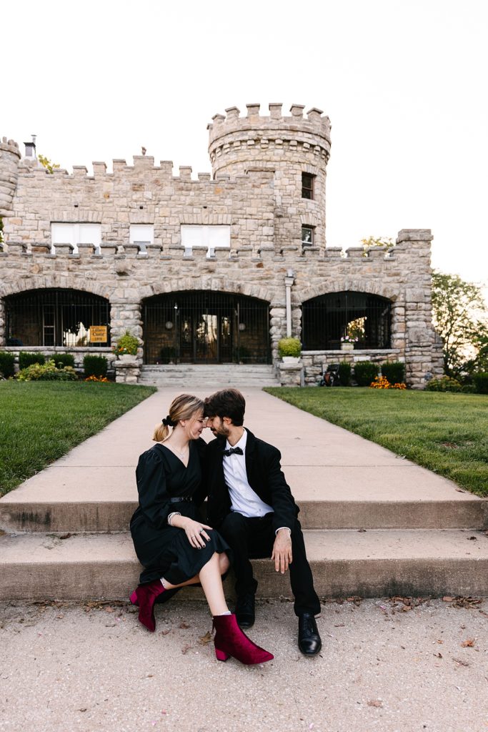 Kansas city photographer, tiffany castle, halloween inspired engagement session, spooky engagement session, alternative engagement session, anti-bride, punk, real couple, castle engagement session, abandon building, abandon castle, october, fall photoshoot, black dress, girl with tattoos, looks like film, film engagement photos