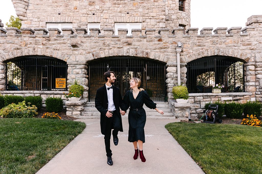 Kansas city photographer, tiffany castle, halloween inspired engagement session, spooky engagement session, alternative engagement session, anti-bride, punk, real couple, castle engagement session, abandon building, abandon castle, october, fall photoshoot, black dress, girl with tattoos, looks like film, film engagement photos