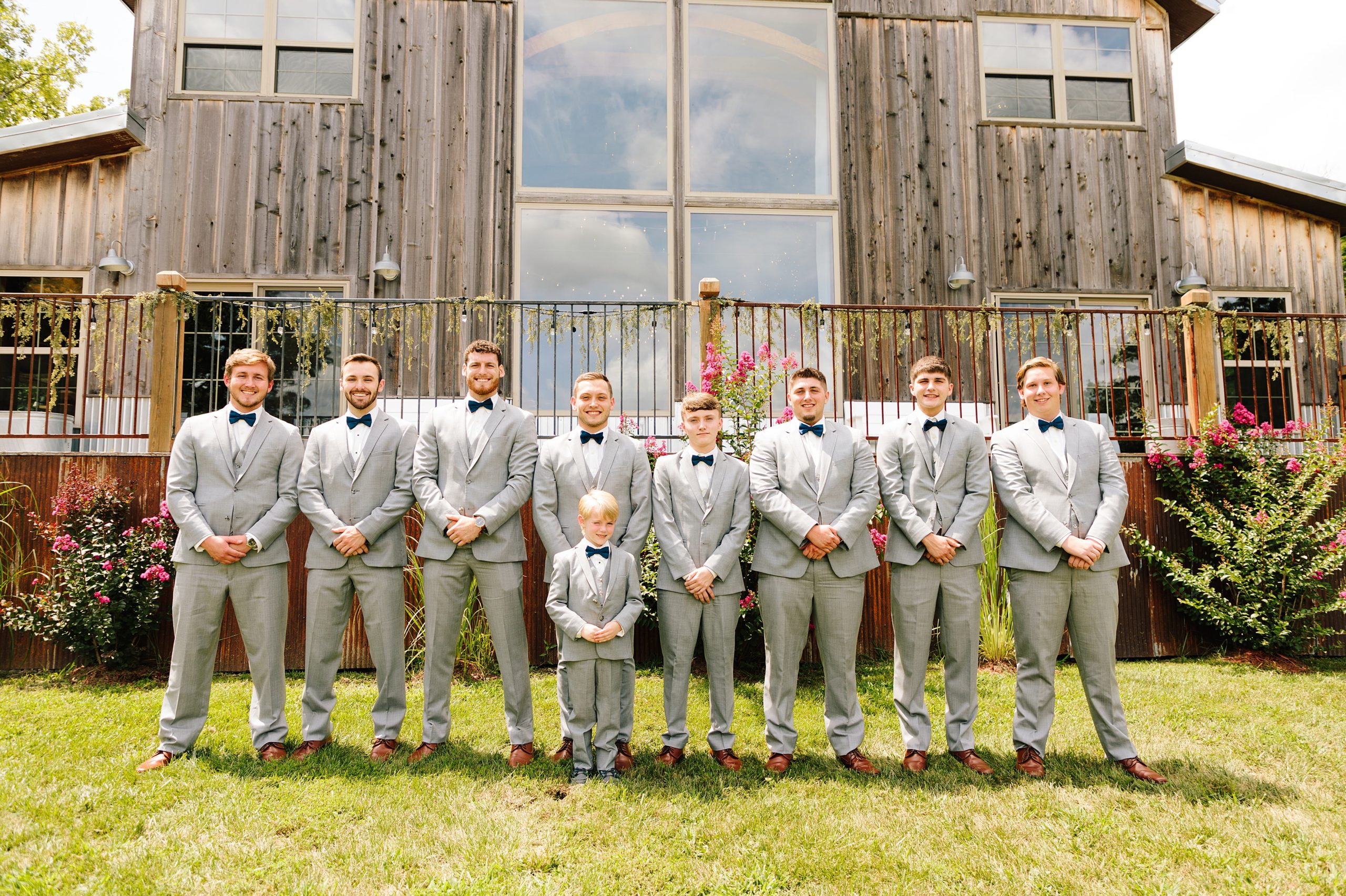groomsmen at weathered wisdom barn