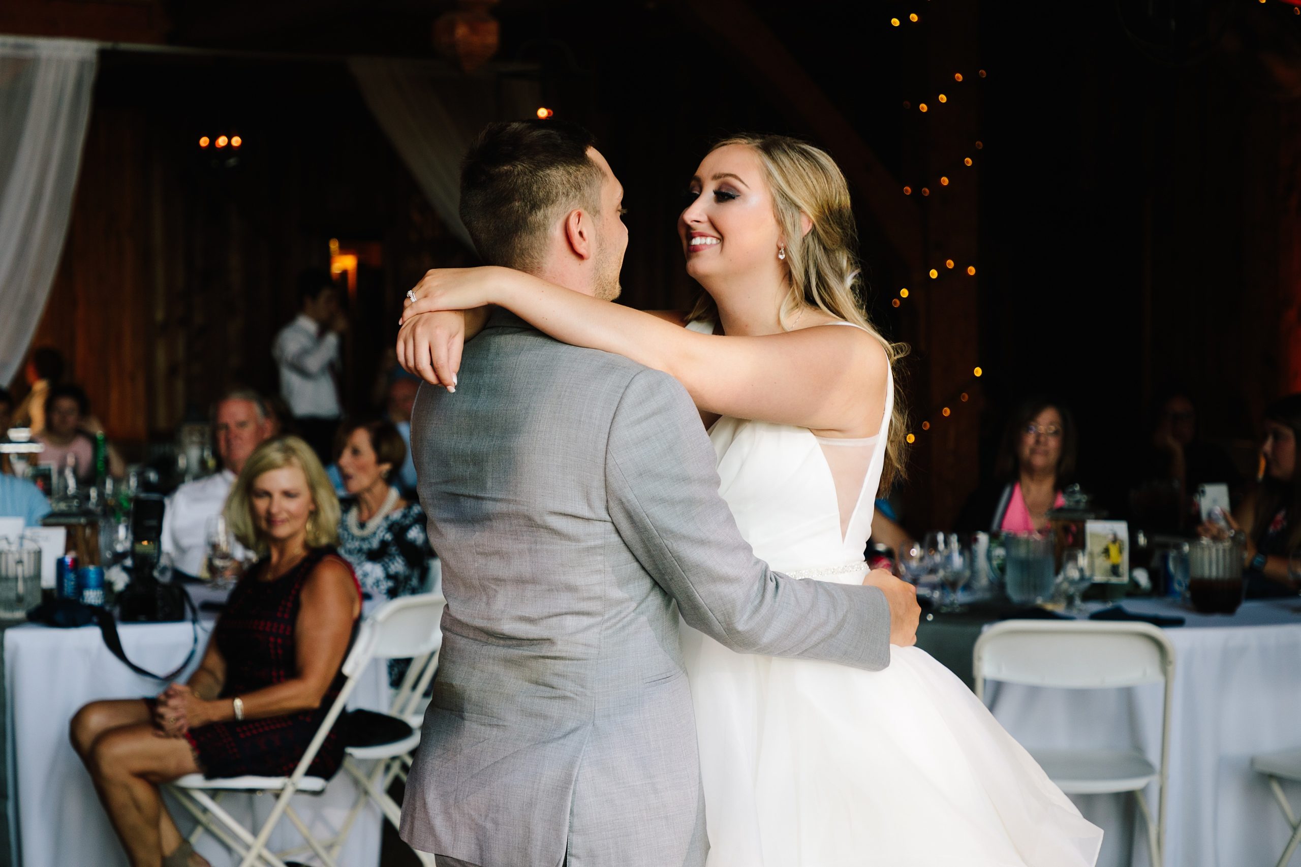 bride and grooms first dance at weathered wisdom barn