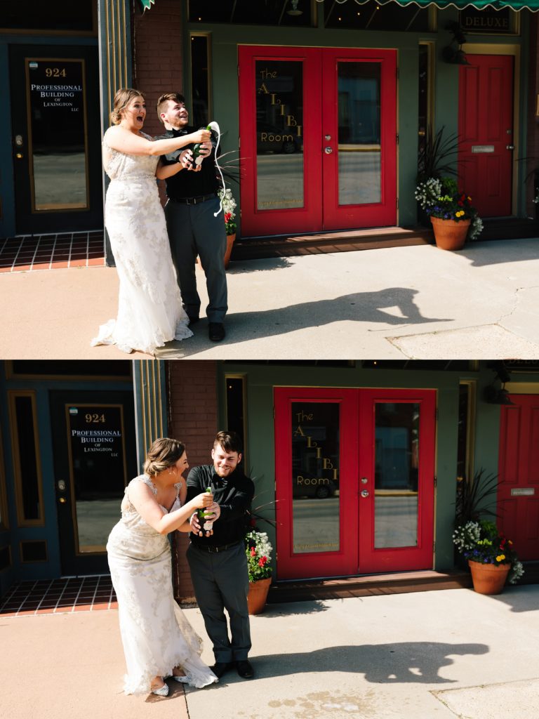 bride and groom popping bottle of champagne during golden hour