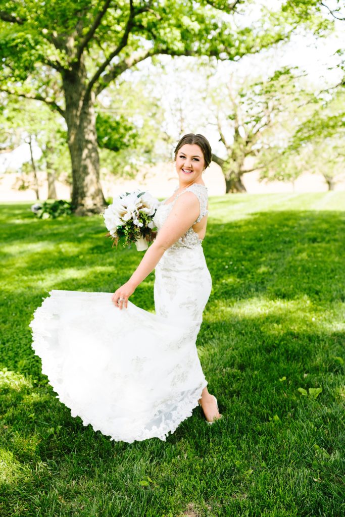 bride twirling in Jade by Maggie Sottero wedding dress