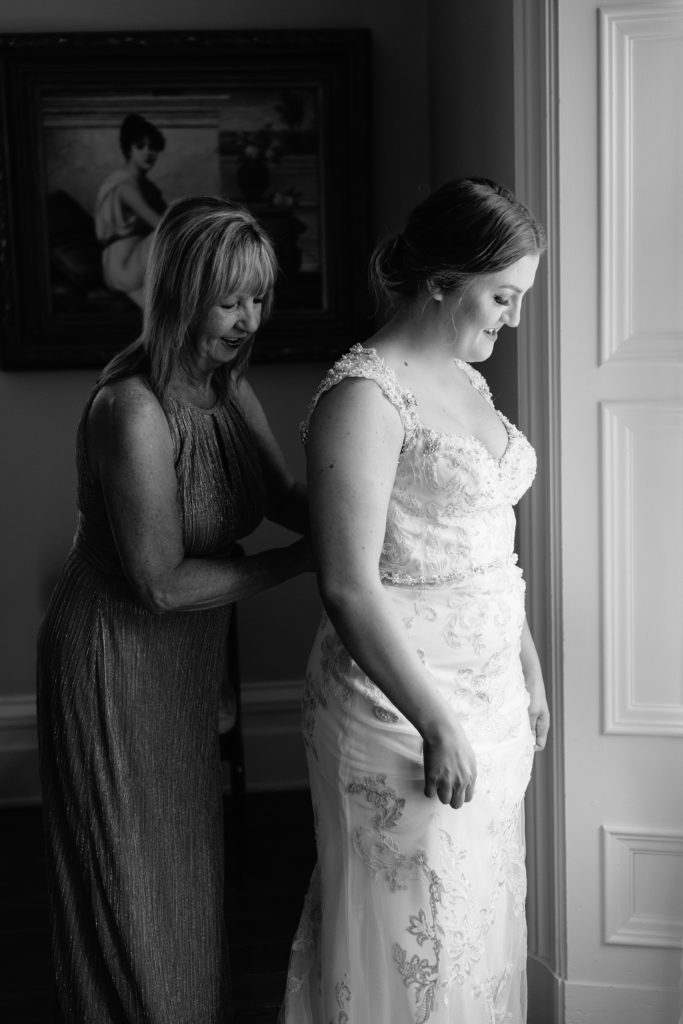 bride with her mom getting ready wearing Jade by Maggie Sottero