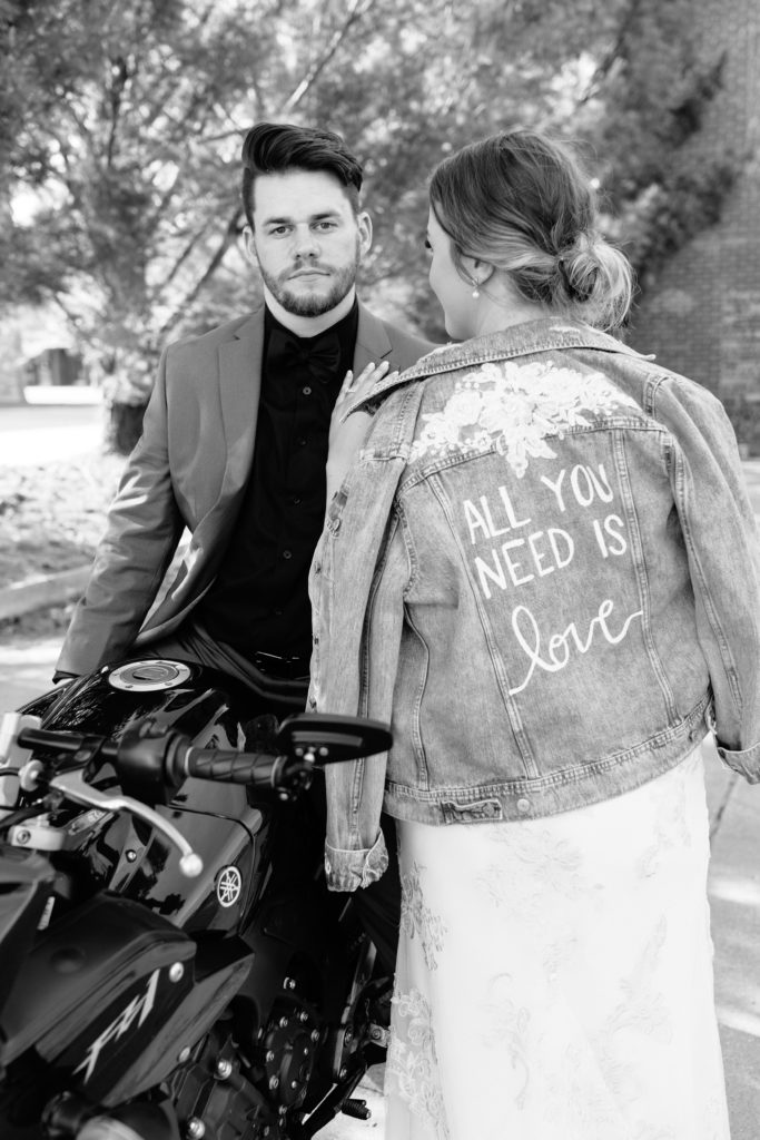 Kansas City bride and groom with motorcycle on their wedding day