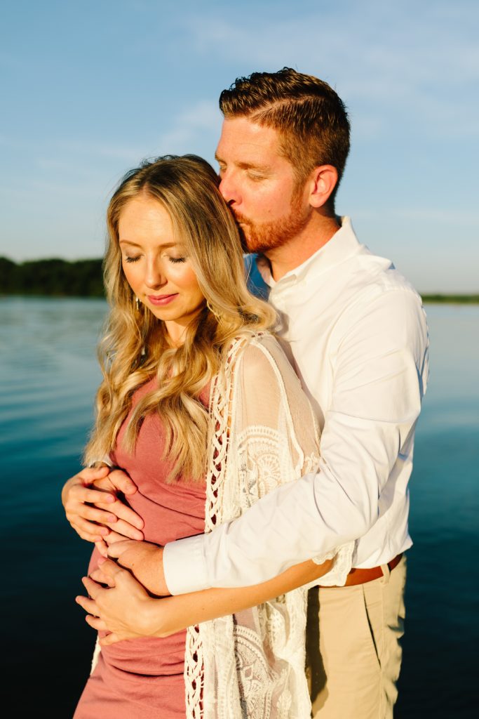 sunrise maternity session at Shawnee Mission Park, Kansas City Photographer, golden hour, outside photo session, pictures by lake, maternity poses, mom to be, baby girl, outfit inspo, maternity pictures, baby announcement