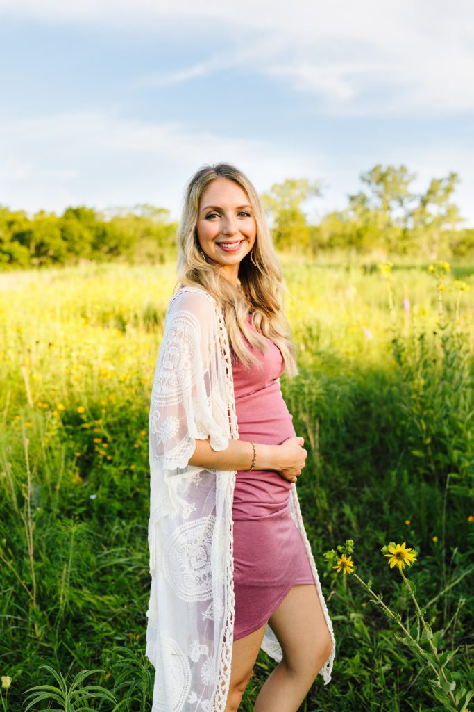 sunrise maternity session at Shawnee Mission Park, Kansas City Photographer, mom to be, what to wear for maternity photos, pink dress, blush midi dress, baby bump, baby girl, glow, yellow wild flowers