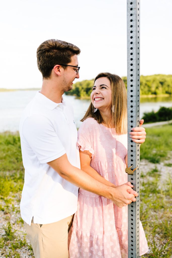 sunset photos, couples session, couples photos, blue springs lake, kanas city photographer, Natalie Nichole Photography, love lock, together forever, our love, real couple, engagement, she said yes, i do, wedding planning