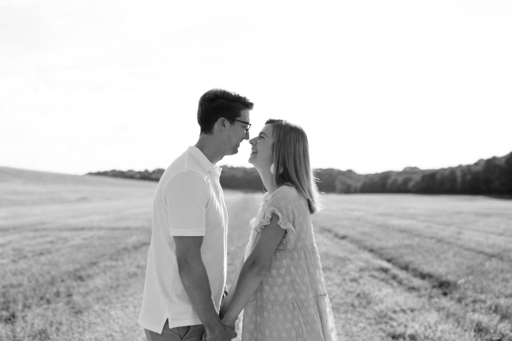 sunset photos, couples session, couples photos, blue springs lake, kanas city photographer, Natalie Nichole Photography, golden hour, black and white, sunflares, real couple
