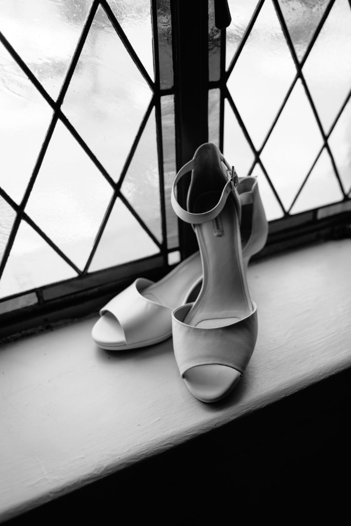 bride's shoes, wedding day details, detail shots, flat lay, black and white, editorial bridal shoes,