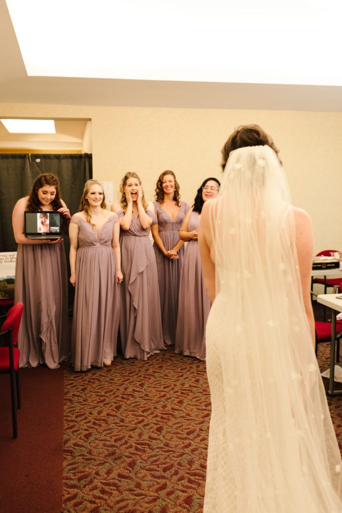 bridesmaids first look with bride before Wedding at Gashland Evangelical Presbyterian Church in Kansas City