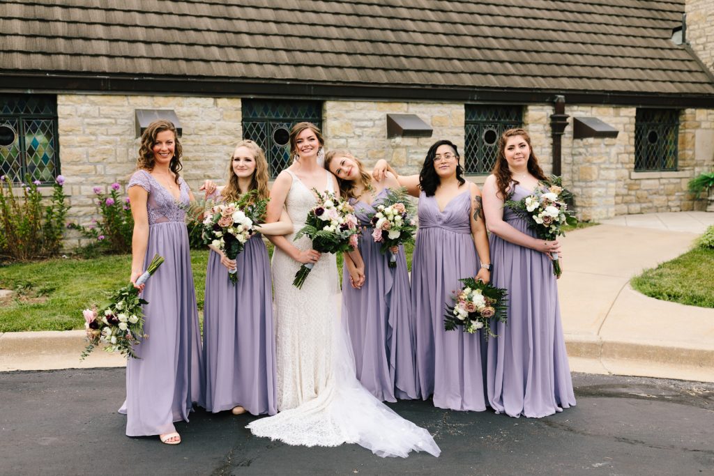 white, blush, maroon, and green bouquets, shades of pink color palette, lavender bridesmaids dresses, large bouquet, roses, pose ideas for five bridesmaids