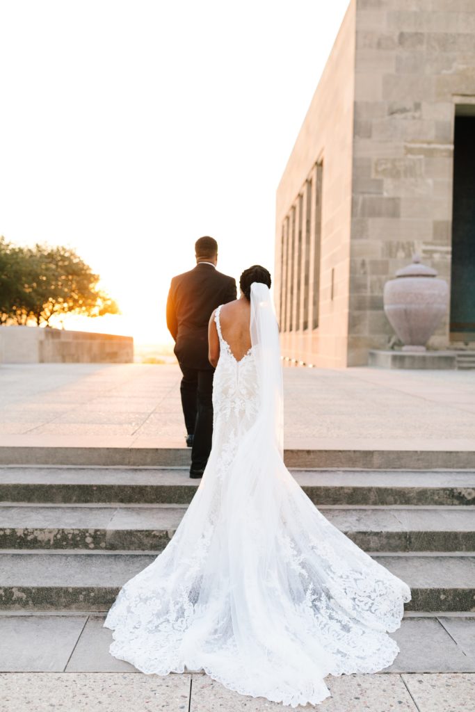 How to elope in kansas city, kansas city wedding photographer, how to plan an elopement, liberty memorial, wwi museum, outdoor elopement, natalie nichole photography, kansas city elopement photographer, kansas city elopement, golden hour wedding photos, lace wedding dress with train,