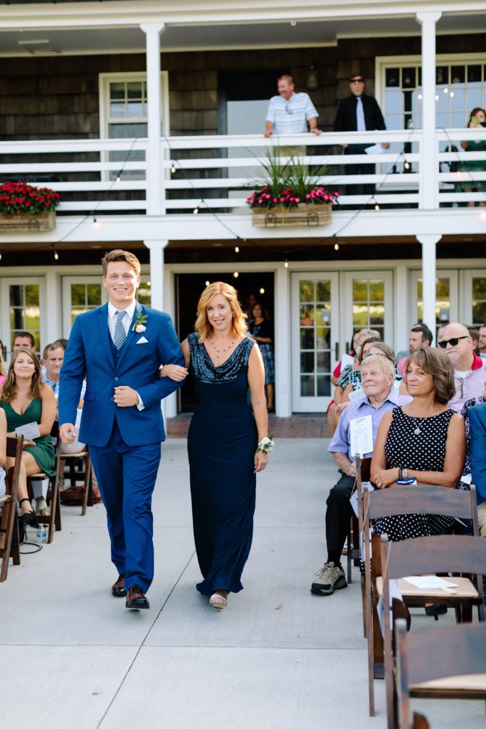 Summer Wedding at Mildale Farm, Natalie Nichole Photography, Kansas City Wedding Photographer, brides brother walking their mom down the aisle, mother of the bride, mob dress, navy mother of the bride dress, outdoor wedding, wedding ceremony outside