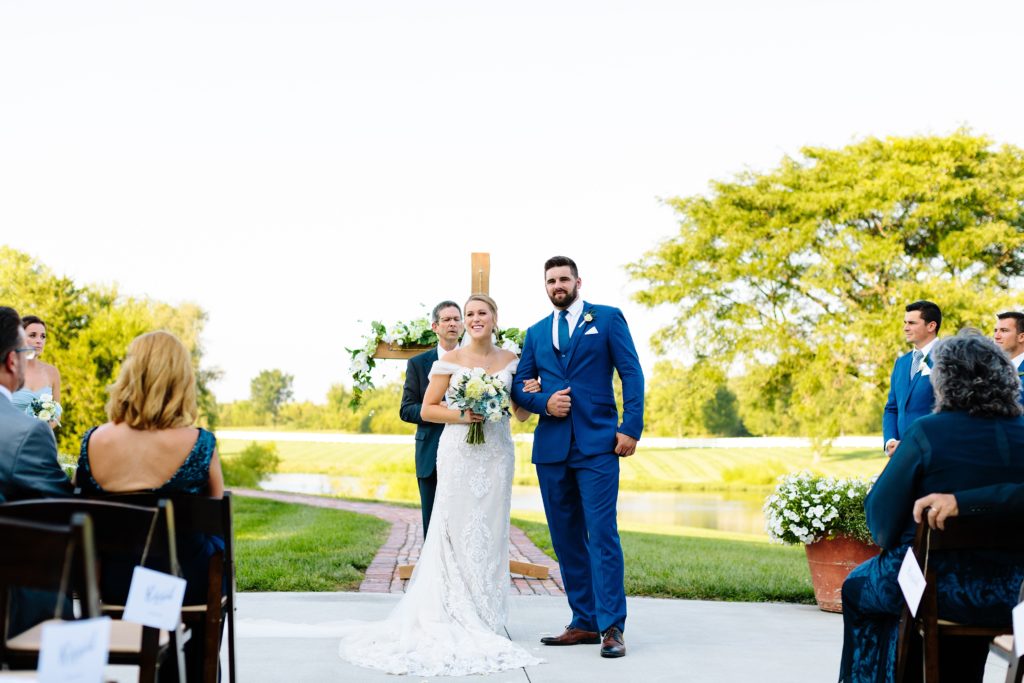 Summer Wedding at Mildale Farm, Natalie Nichole Photography, Kansas City Wedding Photographer, bride and groom looking at guests, outdoor wedding, wedding ceremony outside