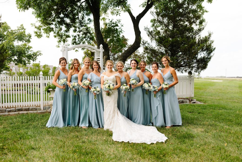 Summer Wedding at Mildale Farm, Natalie Nichole Photography, Kansas City Wedding Photographer, blue and white wedding, anemone, wedding dress, strapless wedding dress, wedding dress with removable straps, cathedral veil, maid of honor, strapless bridesmaid dress, light blue bridesmaids dress, sky blue, summer wedding color palette, 9 bridesmaids, nine bridesmaids, mix and match dress style, same color different dress, shades of blue,