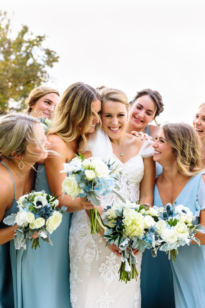 Summer Wedding at Mildale Farm, Natalie Nichole Photography, Kansas City Wedding Photographer, blue and white wedding, anemone, wedding dress, strapless wedding dress, wedding dress with removable straps, cathedral veil, maid of honor, strapless bridesmaid dress, light blue bridesmaids dress, sky blue, summer wedding color palette, 9 bridesmaids, nine bridesmaids, mix and match dress style, same color different dress, shades of blue, blue and white bouquet, the little clover, white roses, wedding day makeup, bridal make up, natural wedding day makeup