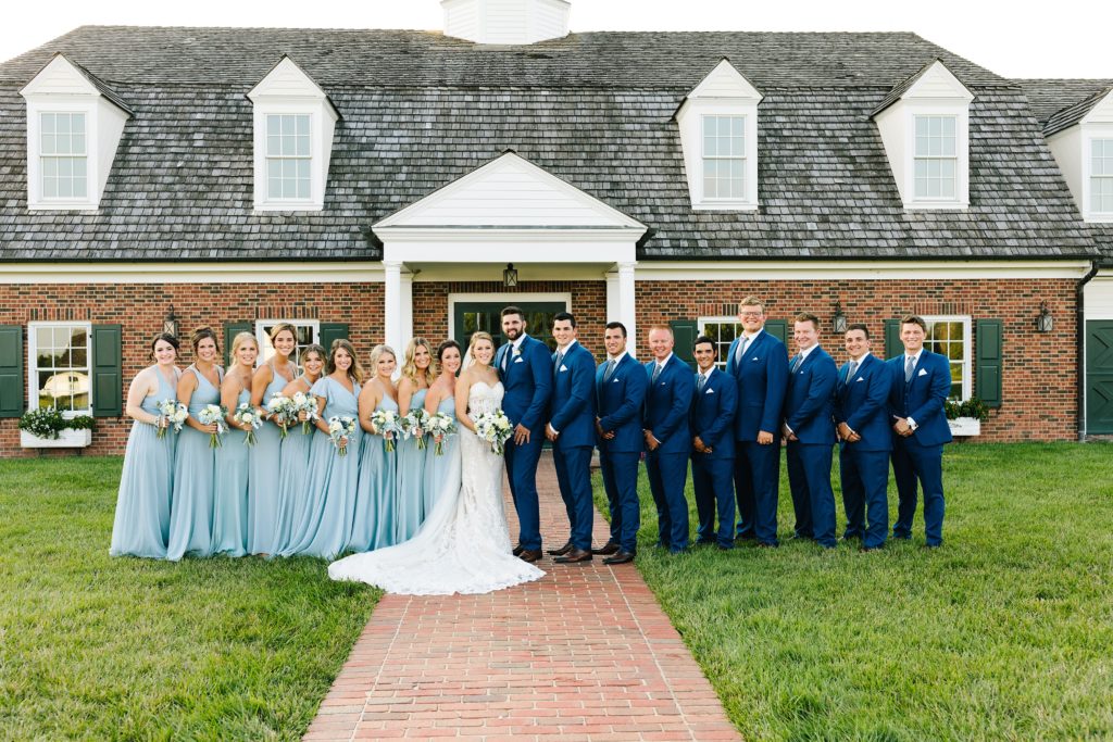 Summer Wedding at Mildale Farm, Natalie Nichole Photography, Kansas City Wedding Photographer, blue and white wedding, anemone, wedding dress, strapless wedding dress, wedding dress with removable straps, cathedral veil, maid of honor, strapless bridesmaid dress, light blue bridesmaids dress, sky blue, summer wedding color palette, 9 bridesmaids, nine bridesmaids, mix and match dress style, same color different dress, shades of blue, blue and white bouquet, the little clover, white roses, wedding party, eight groomsmen, 8 groomsmen, big wedding party, how to photograph large wedding party, big wedding party photo ideas
