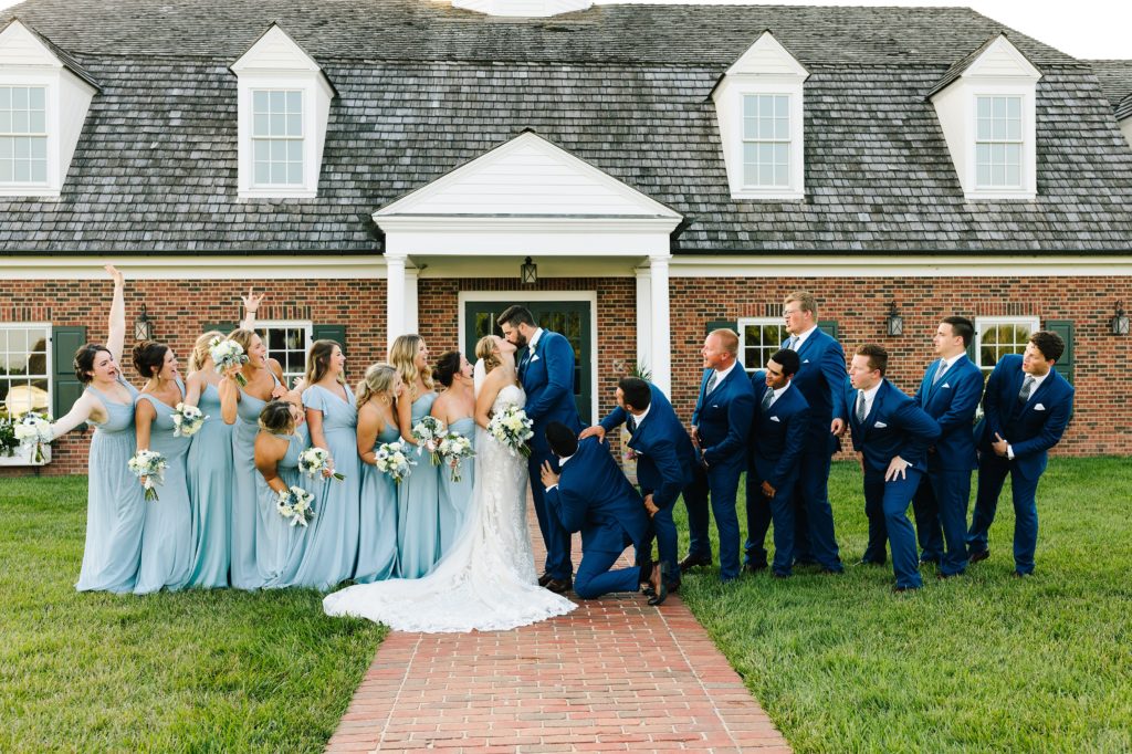 Summer Wedding at Mildale Farm, Natalie Nichole Photography, Kansas City Wedding Photographer, blue and white wedding, anemone, wedding dress, strapless wedding dress, wedding dress with removable straps, cathedral veil, maid of honor, strapless bridesmaid dress, light blue bridesmaids dress, sky blue, summer wedding color palette, 9 bridesmaids, nine bridesmaids, mix and match dress style, same color different dress, shades of blue, blue and white bouquet, the little clover, white roses, wedding party, eight groomsmen, 8 groomsmen, big wedding party, wedding party photo ideas, bridal party