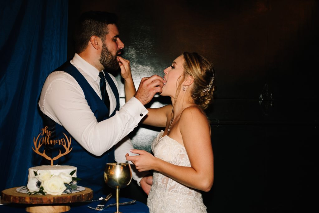 Summer Wedding at Mildale Farm, Natalie Nichole Photography, Kansas City Wedding Photographer, cake cutting, small cake to cut, wooden cake topper, toasting goblets, wooden cake stand, barn wedding,