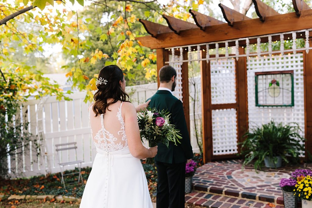 bride and grooms first look at their intimate wedding after downsizing their guest list
