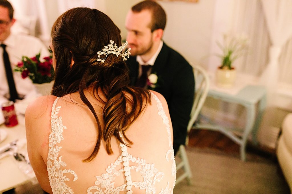 traditional bride with half up half down hair and a boho sparkly hairpiece comb