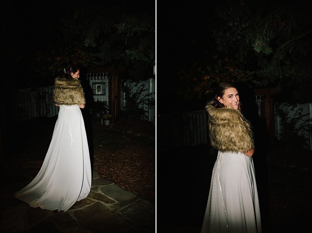 vintage bride wears a faux fur shawl over her wedding dress from savvys bridal