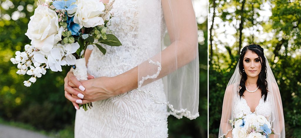 bride wearing sleeveless lace wedding dress with beading detail holding her blush, blue, and white bouquet, pale pink bridal manicure, and pearl necklace