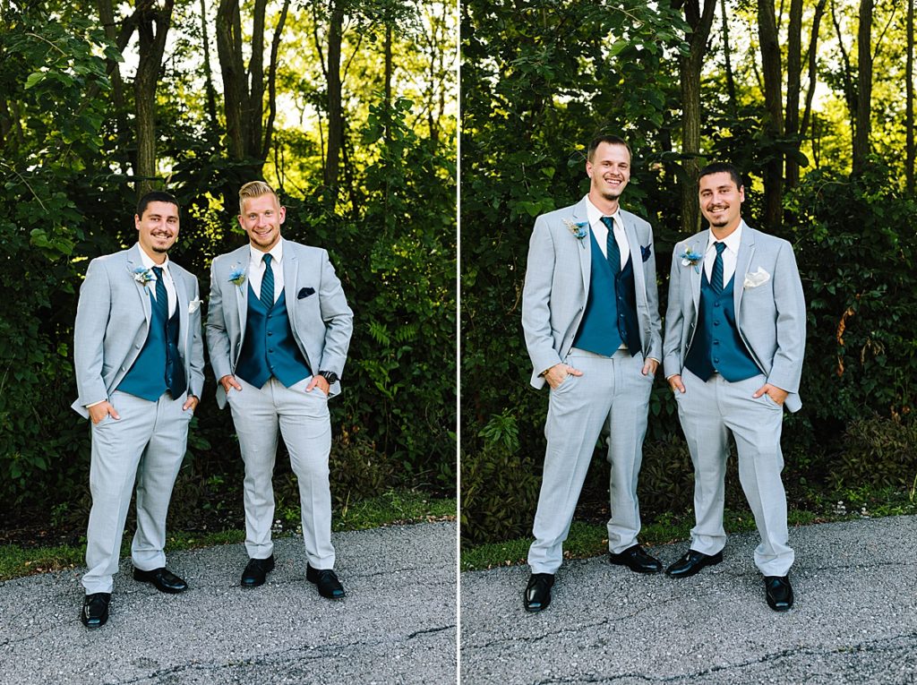groom with his groomsmen wearing grey suits navy vests and navy ties for the summer wedding in kansas city