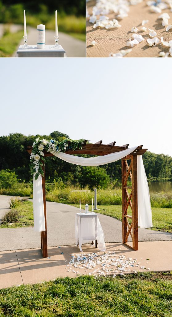 Kansas City outdoor wedding ceremony at Stoney Creek hotel in independence Missouri with wooden arbor, florals, white draping and unity candle