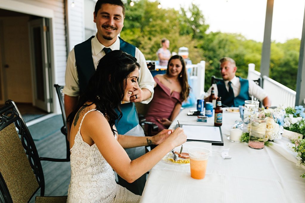 bride and groom at their backyard wedding reception in Kansas City