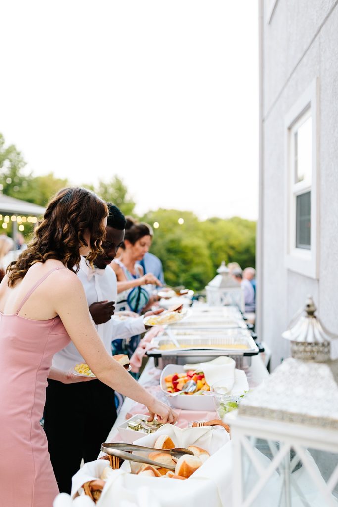 buffet line at backyard wedding reception