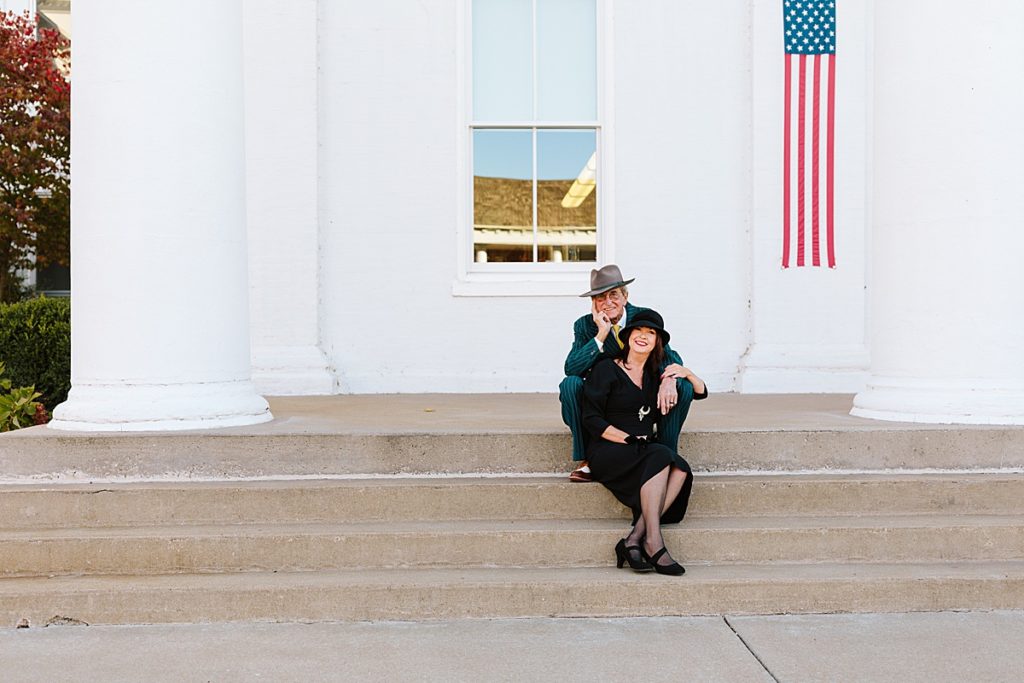couple wearing 1920's inspired costumes outside the Lexington Missouri Courthouse and townhall