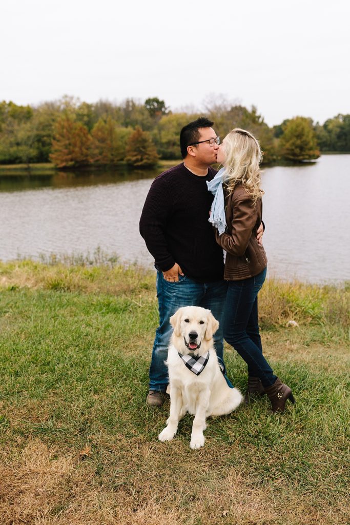 couple and their golden retriever at James A Reed Memorial Wildlife Area in Kansas City