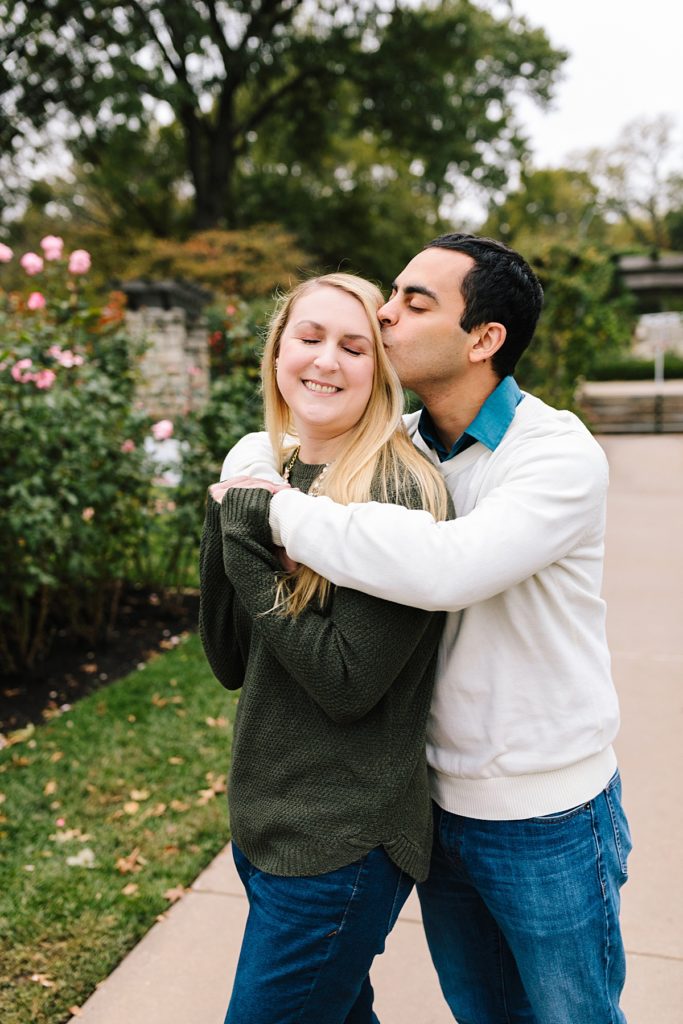 guy kisses girls head prompt for cute poses for couples photos, great for beginning photographers