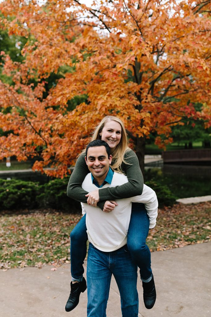 piggy back ride picture for couples session in the fall, playful pose idea