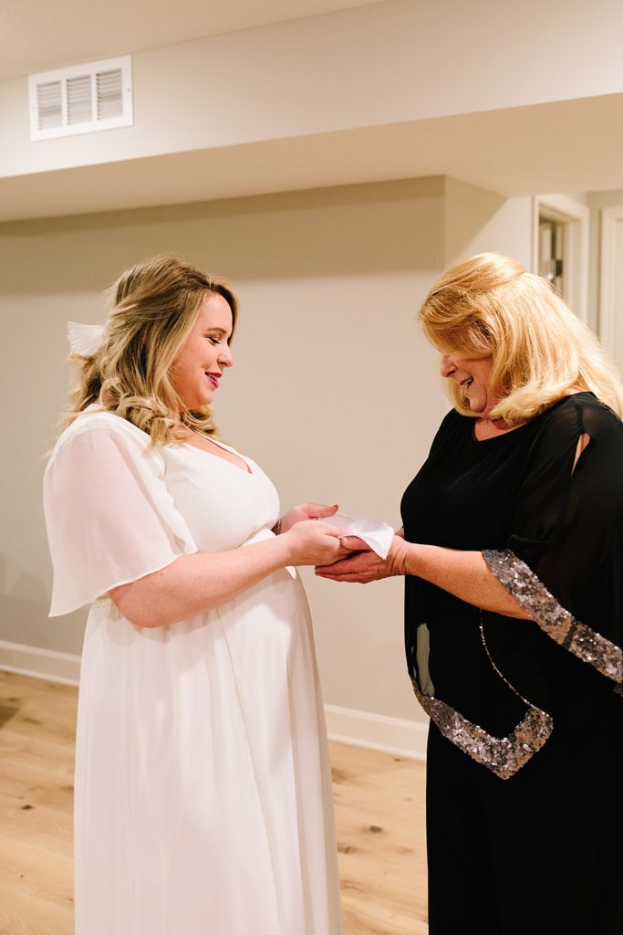 bride gives her mother a gift, a custom personal handkerchief