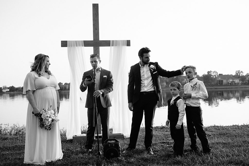 bride and groom read vows to their kids during their elopement, how to include your kids in your wedding ceremony, step mom,