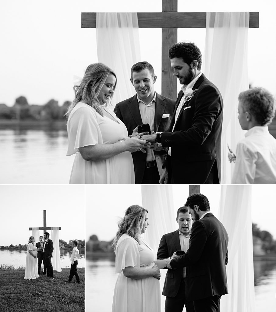 bride and groom exchange rings and wedding bands at their outdoor elopement at raintree lake in Kansas City