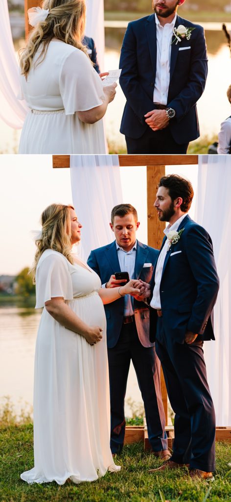 bride reads vows to fiance, groom wearing a navy suit, at their outdoor fall wedding ceremony, intimate elopement on lake
