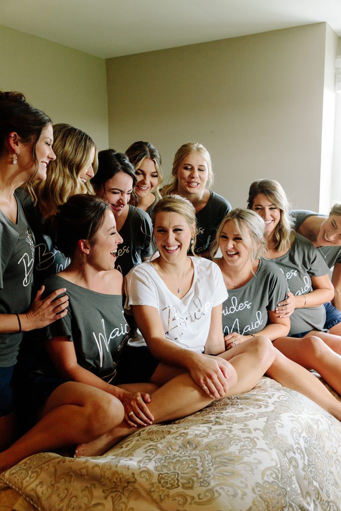 Choosing Your Getting Ready Space: Tips From a KC Wedding Photographer, bride and bridesmaid shirts, maid of honor, mildale farm, kansas city wedding, 9 bridesmaids,