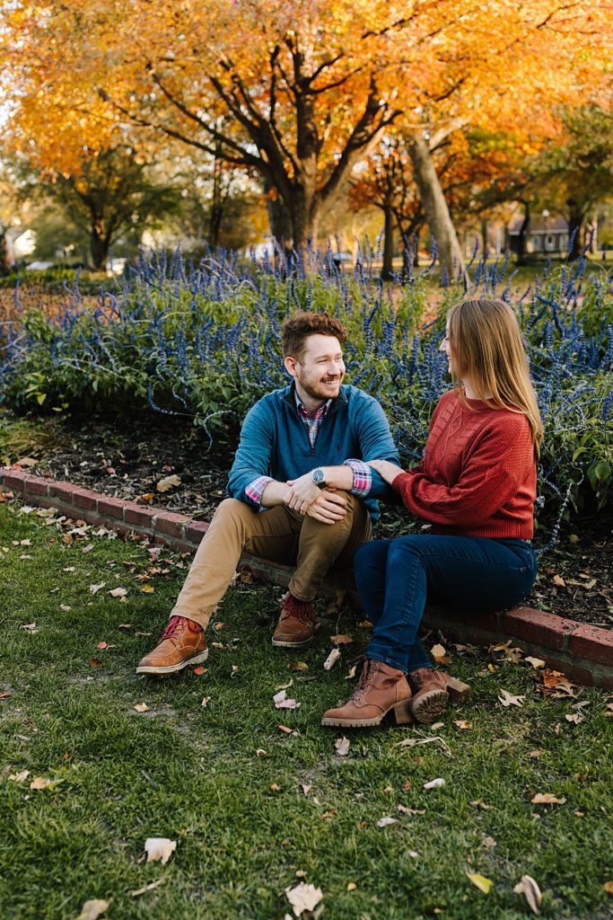 fall date ideas, pizza in the park, pizza picnic, pizza photoshoot, engagement session ideas, what to do at your engagement photos, chill couple, unique couple, adventurous couple, laid back couples photos, lawrence kansas, rock chalk, mass street, lawrence date ideas, fun couples photos, covid date ideas, socially distanced date ideas,