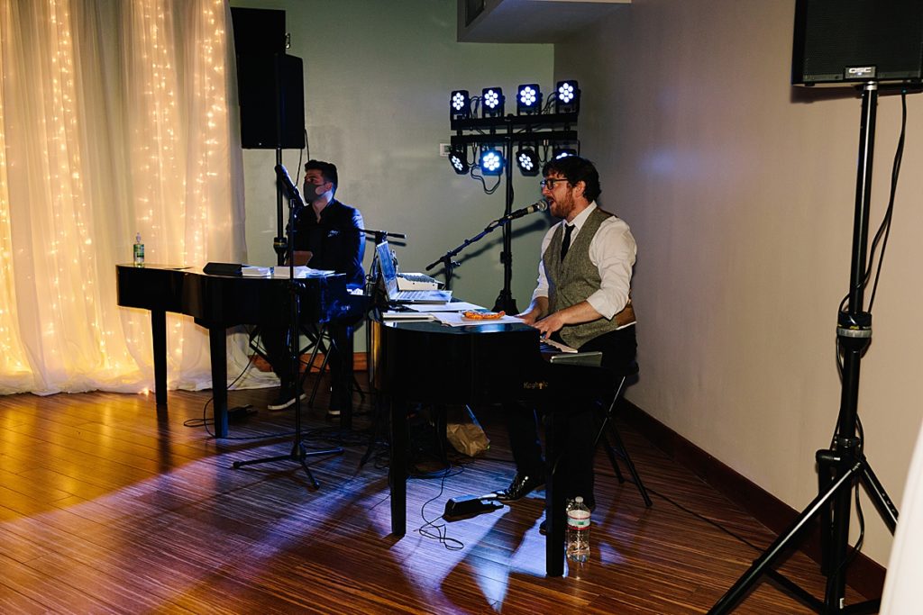 dueling pianos at a covid safe wedding reception