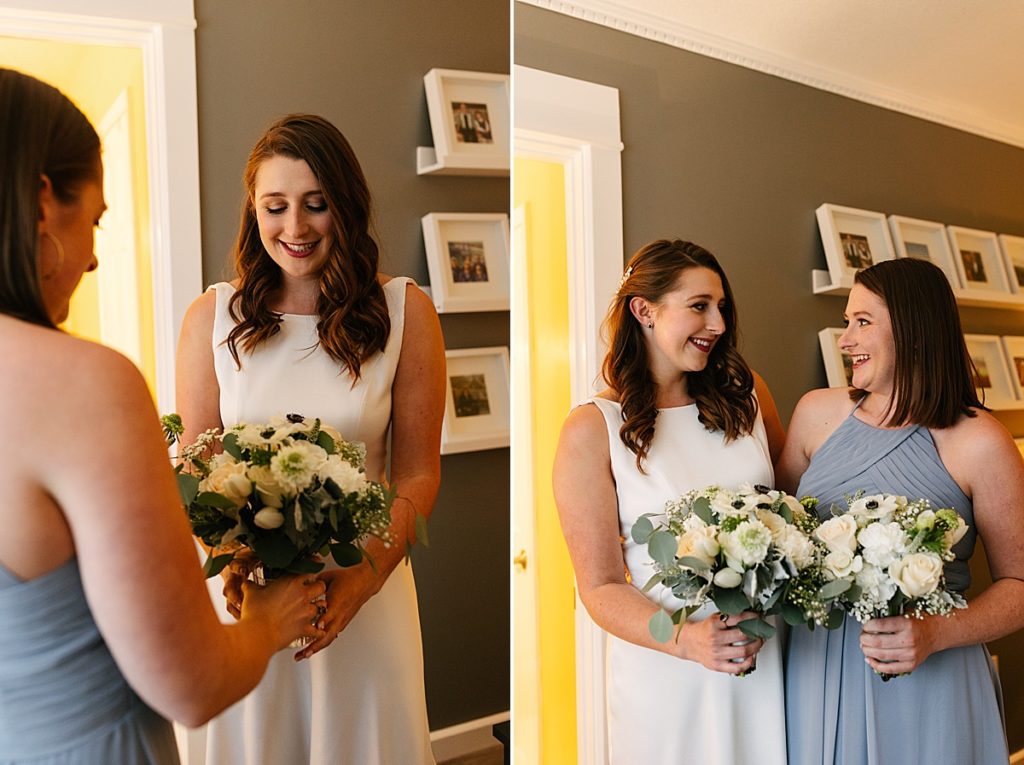 kansas wedding photographer, sisters on wedding day, light blue bridesmaids dress, white florals with greenery,