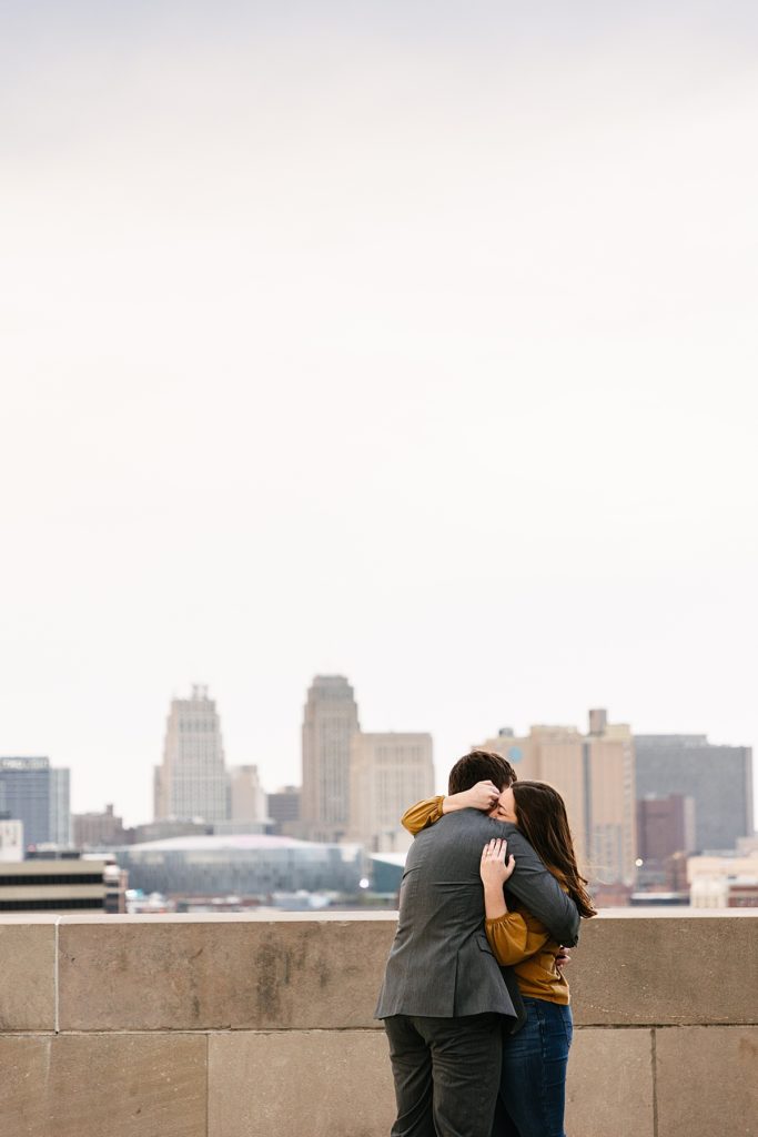 Proposal at the WWI memorial in Kansas City, how to propose, when to propose, proposal photographer in kansas city, kansas city engagement photographer, what to wear when you get engaged, should i propose, engagement ring, kansas city skyline, where to propose in kansas city